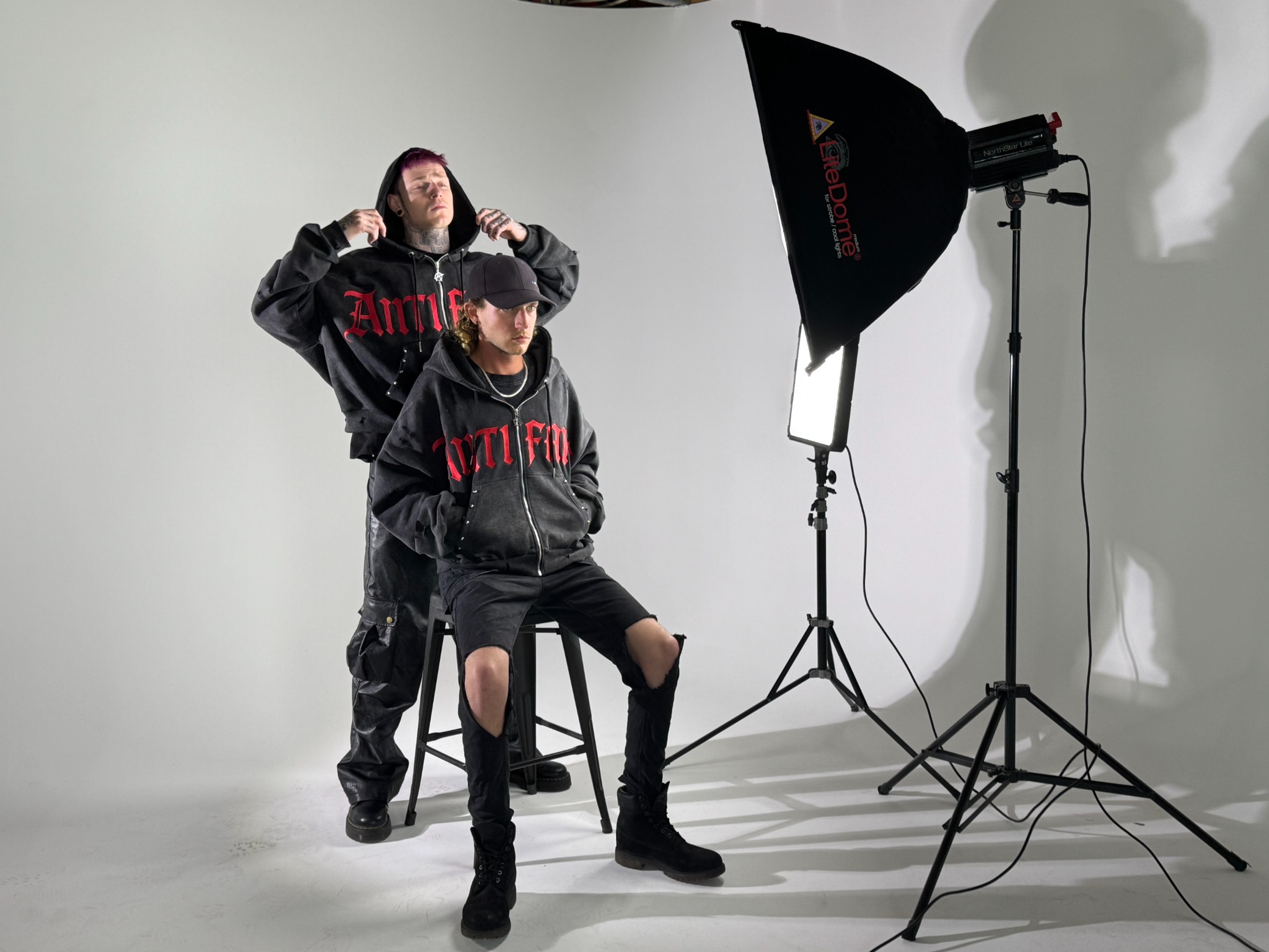 Behind-the-scenes wardrobe and lighting setup